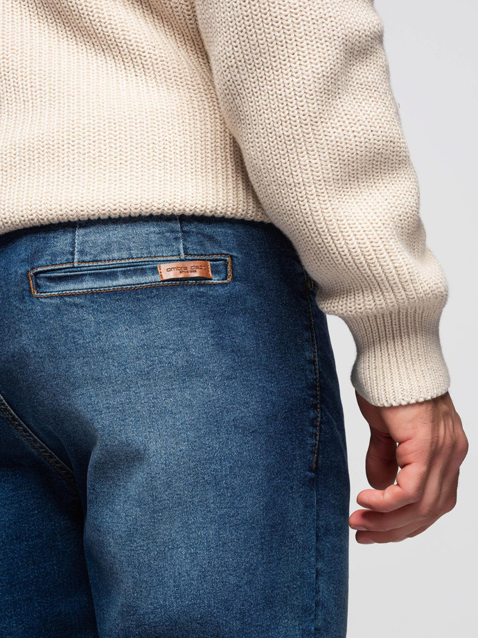 Męskie spodnie jeansowe CARROT z przetarciami - niebieskie V2 OM-PADP-0253