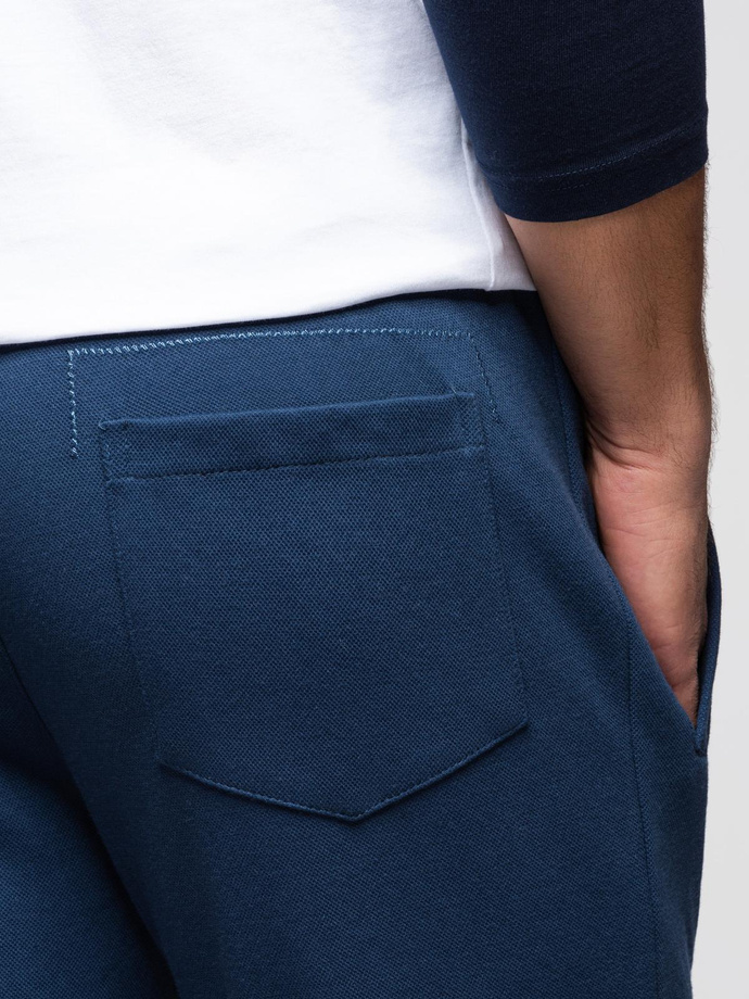 Spodnie męskie dresowe CARROT ze strukturalnej dzianiny - ciemnoniebieskie V5 OM-PASK-0143