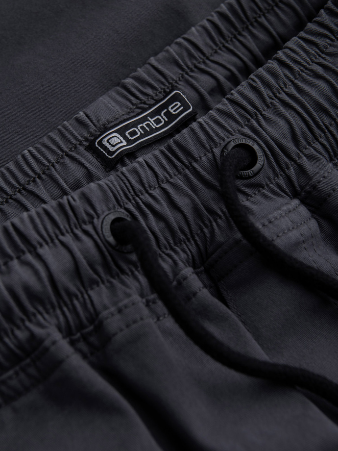 Męskie spodnie JOGGERY z zapinanymi kieszeniami cargo - grafitowe V3 OM-PAJO-0125