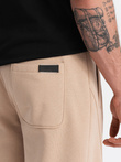 Męskie bawełniane spodnie joggery dresowe BASIC – beżowe V6 OM-PABS-0174