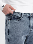 Męskie spodnie jeansowe marmurkowe z surowo wykończoną nogawką SLIM FIT - ciemnoniebieskie V4 OM-PADP-0146