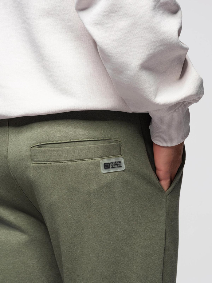 Spodnie męskie dresowe joggery - oliwkowe V4 OM-PASK-0280