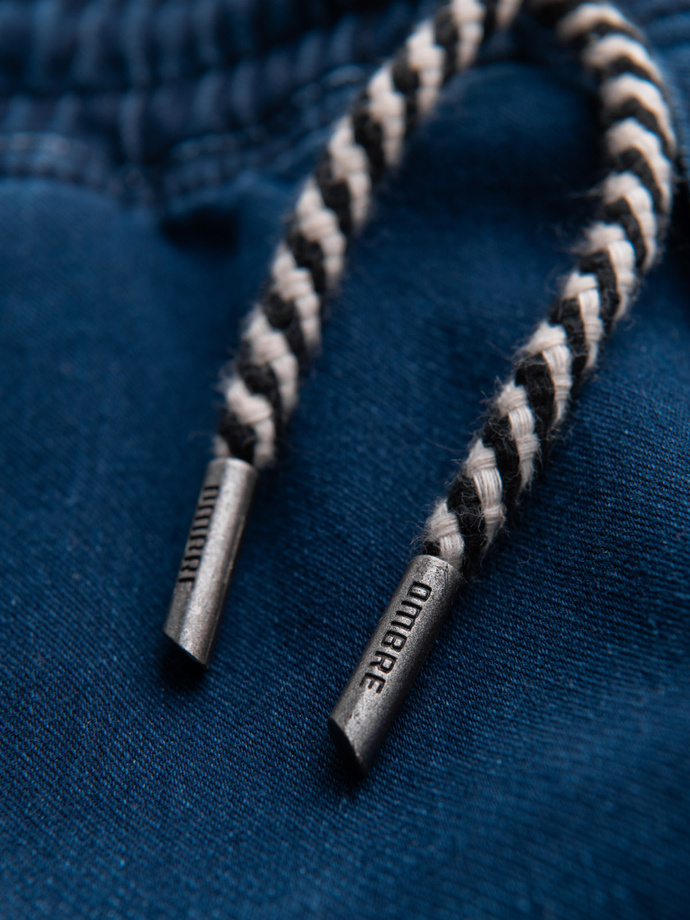 Męskie spodnie jeansowe joggery ze ściagaczem w pasie - ciemnoniebieskie V3 OM-PADJ-0242