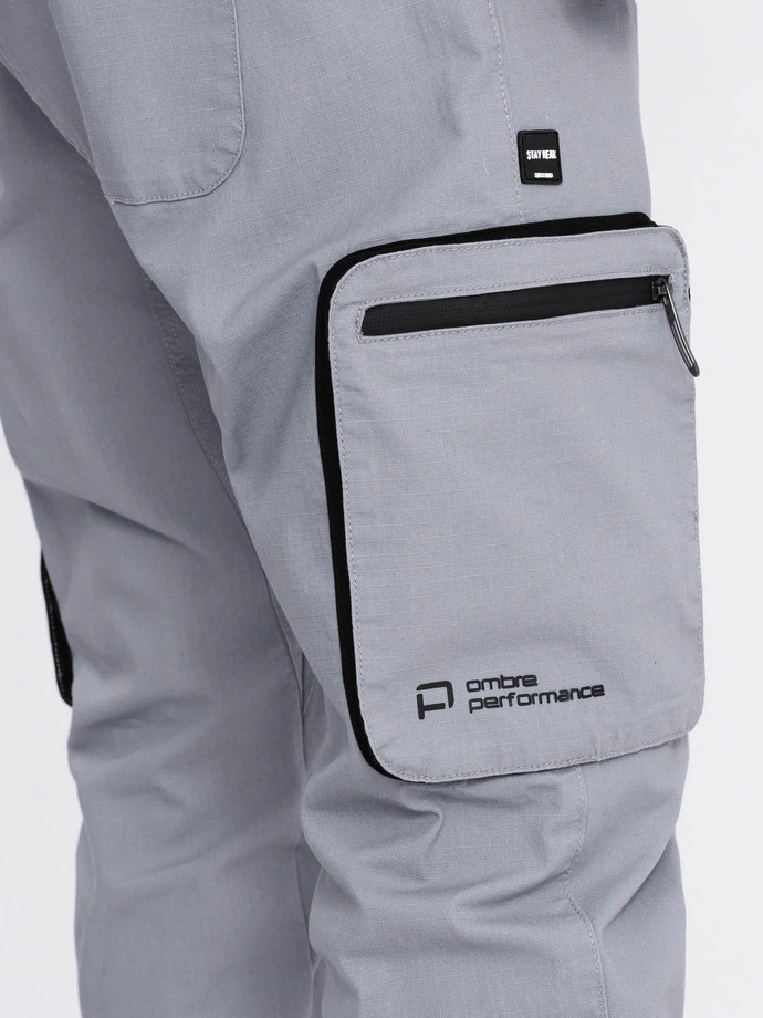 Spodnie męskie JOGGERY z odstającymi i zapinanymi kieszeniami cargo - jasnoszare V8 OM-PAJO-0135