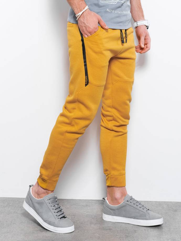 Spodnie męskie dresowe joggery - żółte V6 P919