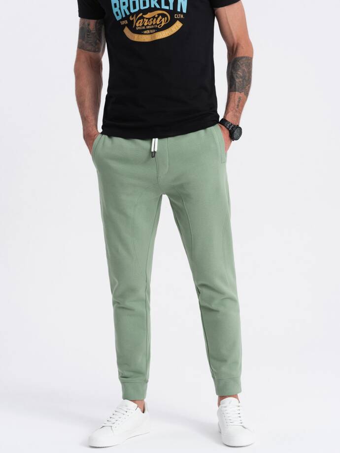 Spodnie męskie dresowe typu jogger - zielone V3 OM-PABS-0173
